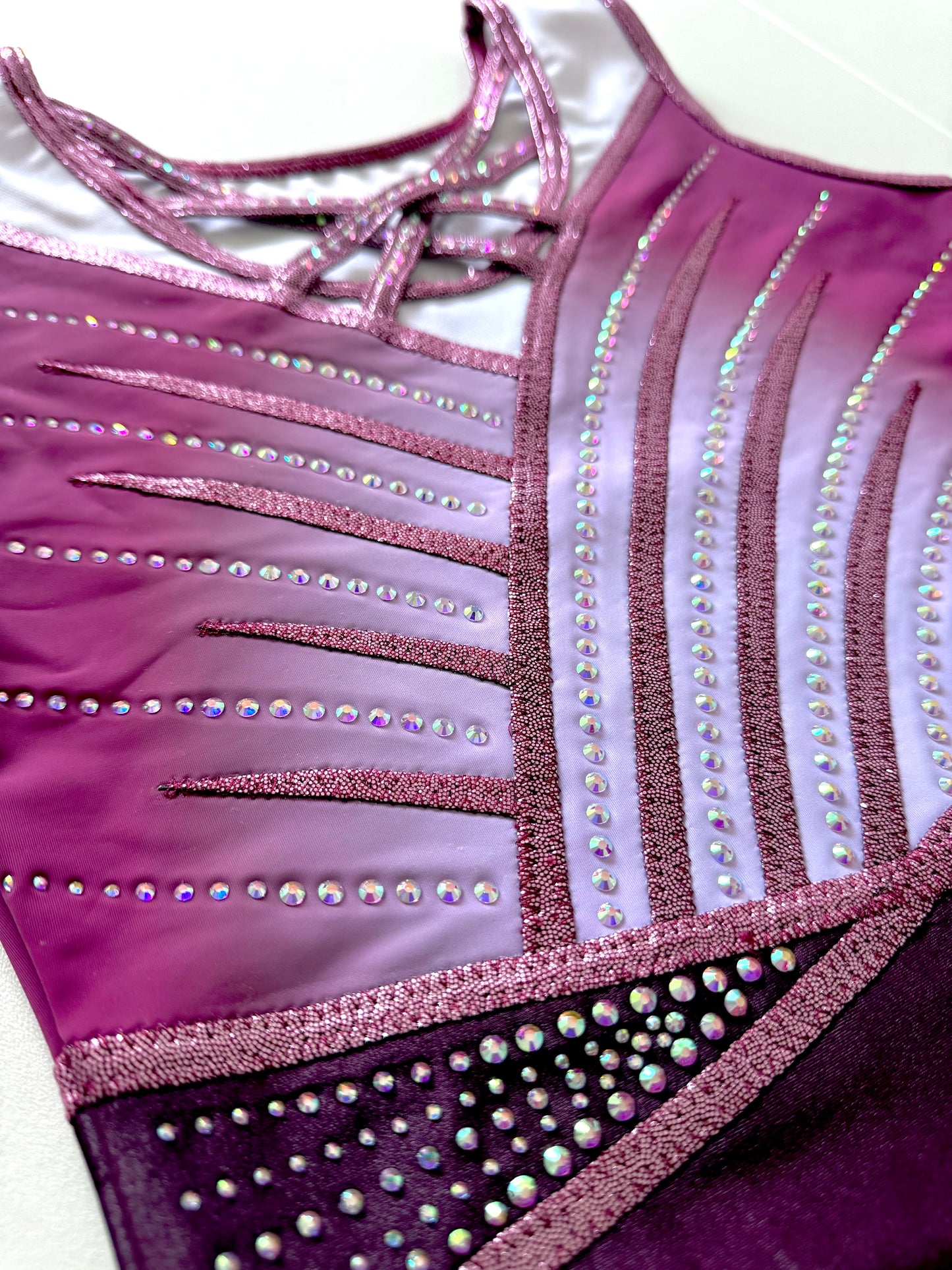 Strappy sparkly gymnastics leotard.
