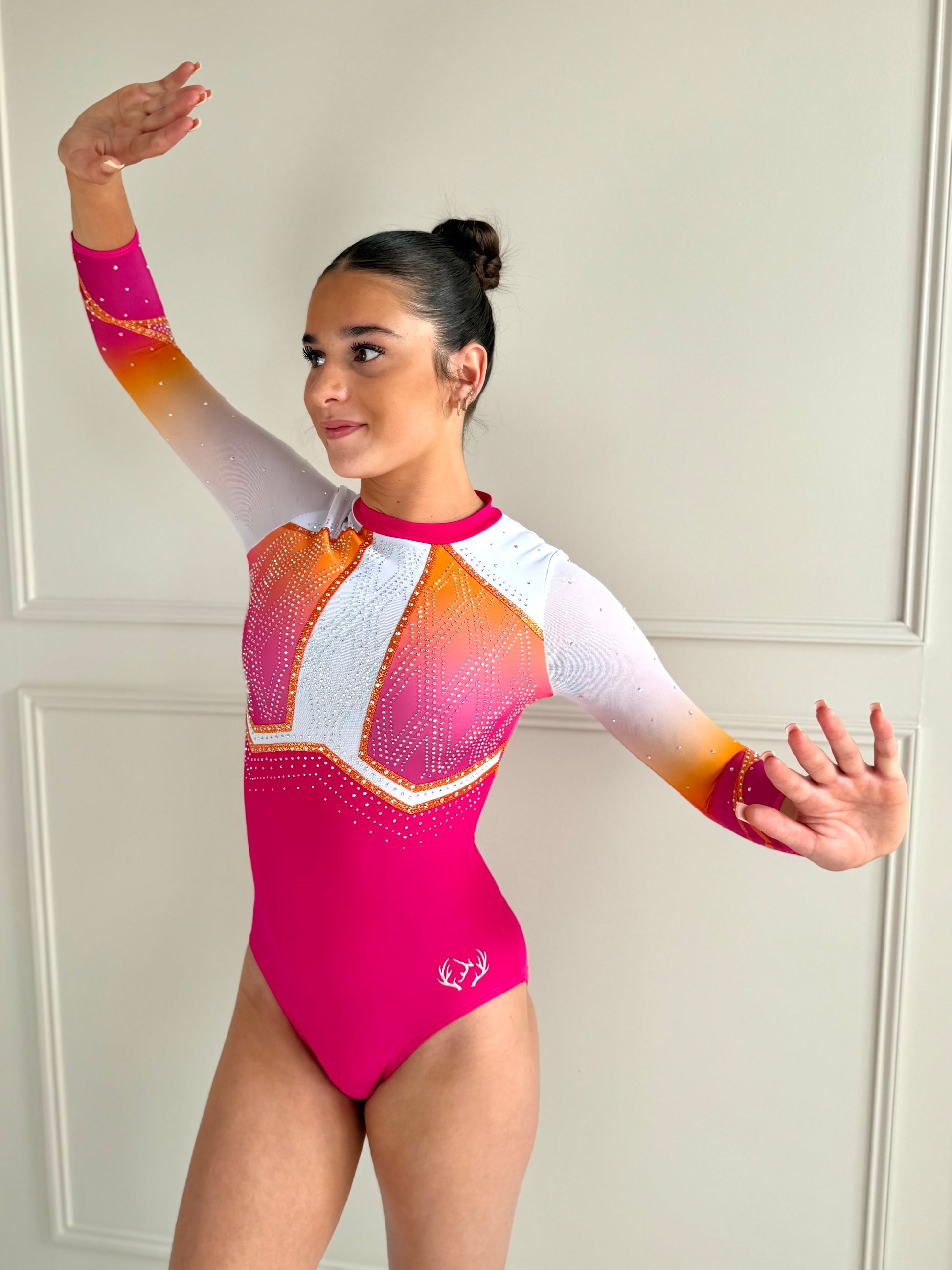 Fuchsia competition leotard.