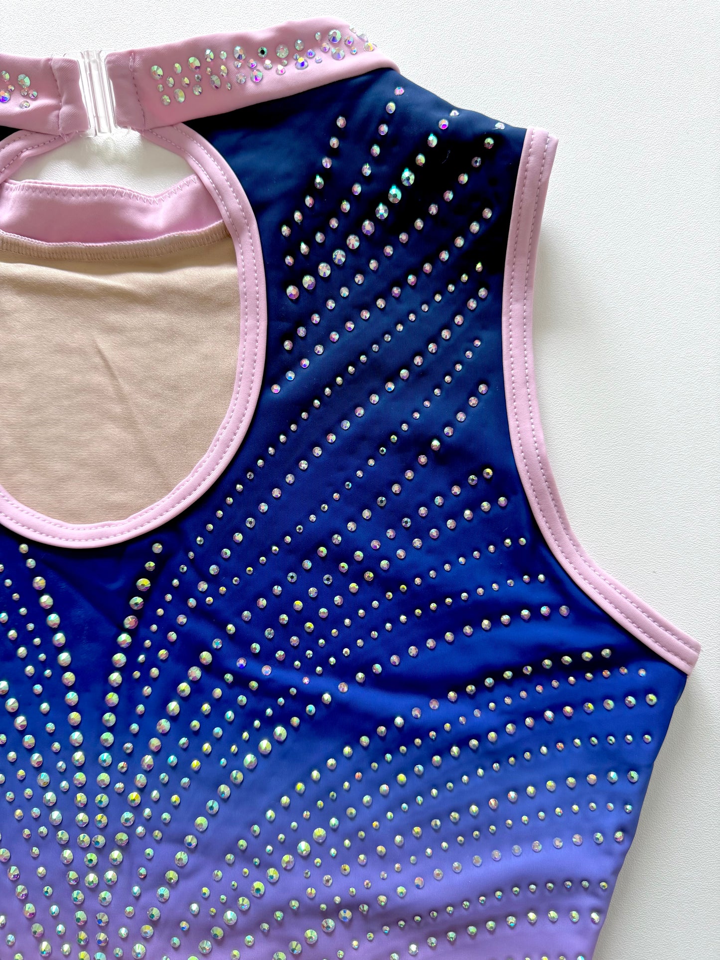 Clasp back gymnastics leotard.