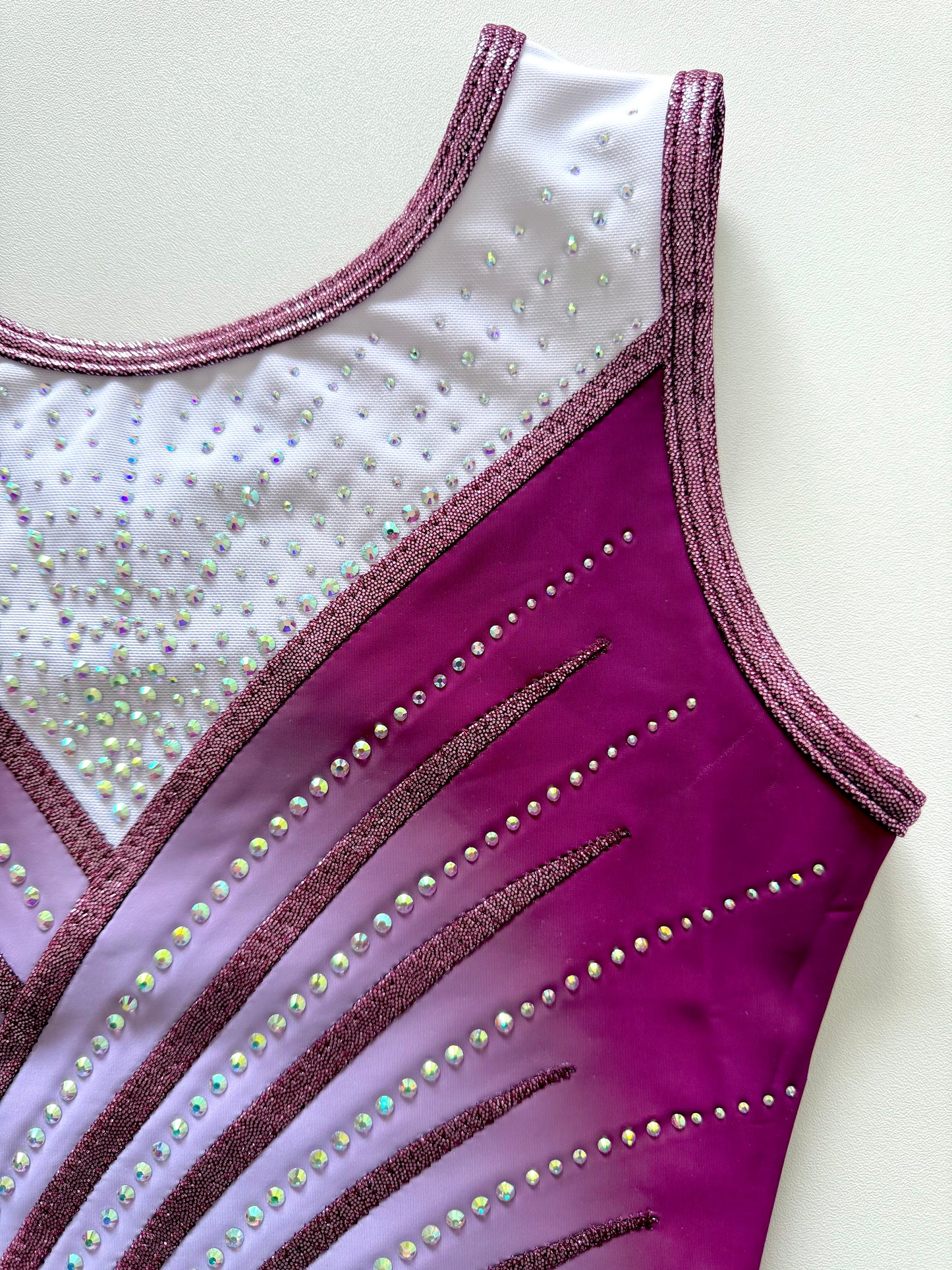 Blush pink gymnastics leotard.