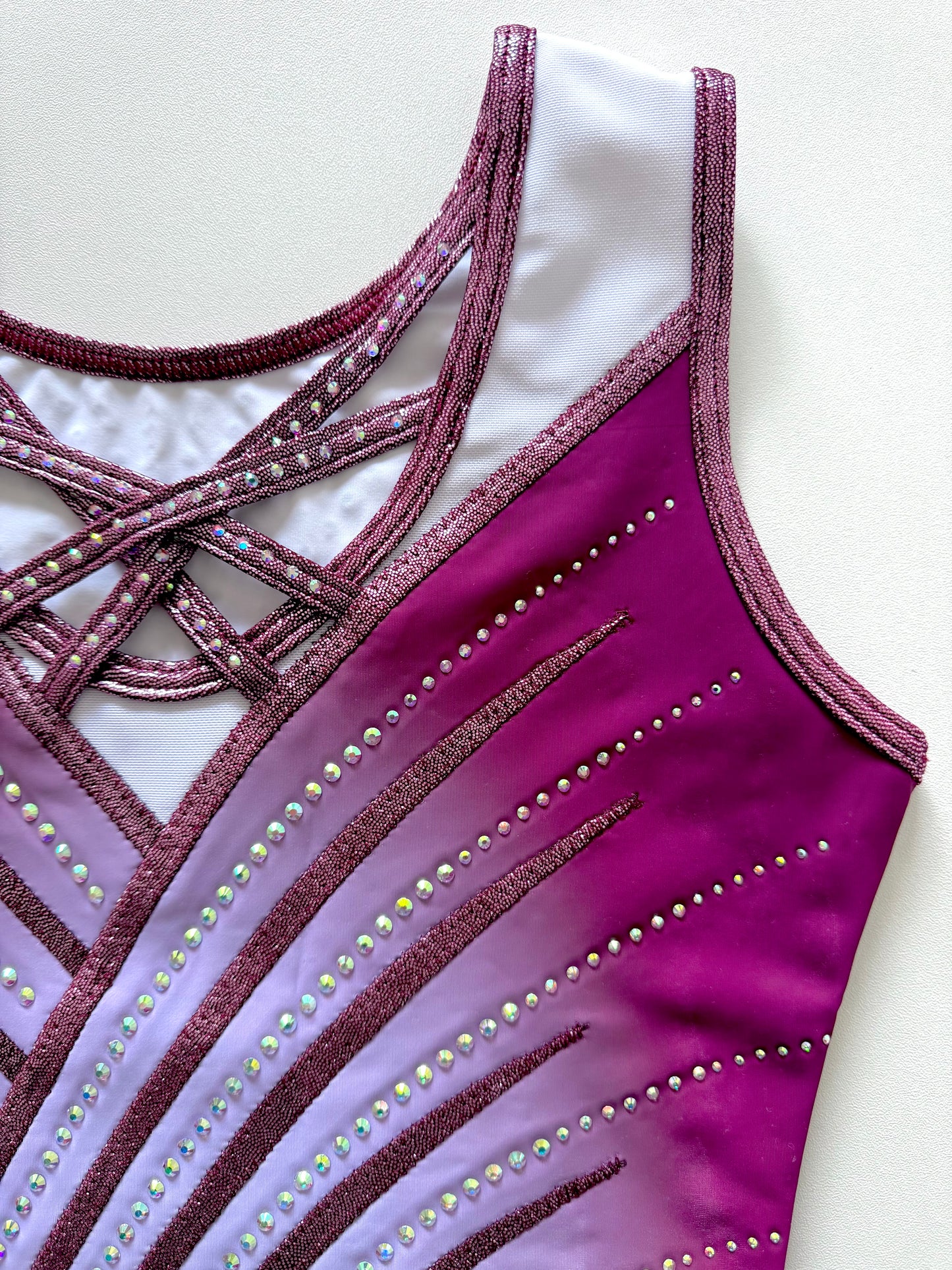 Strappy closed back leotard.