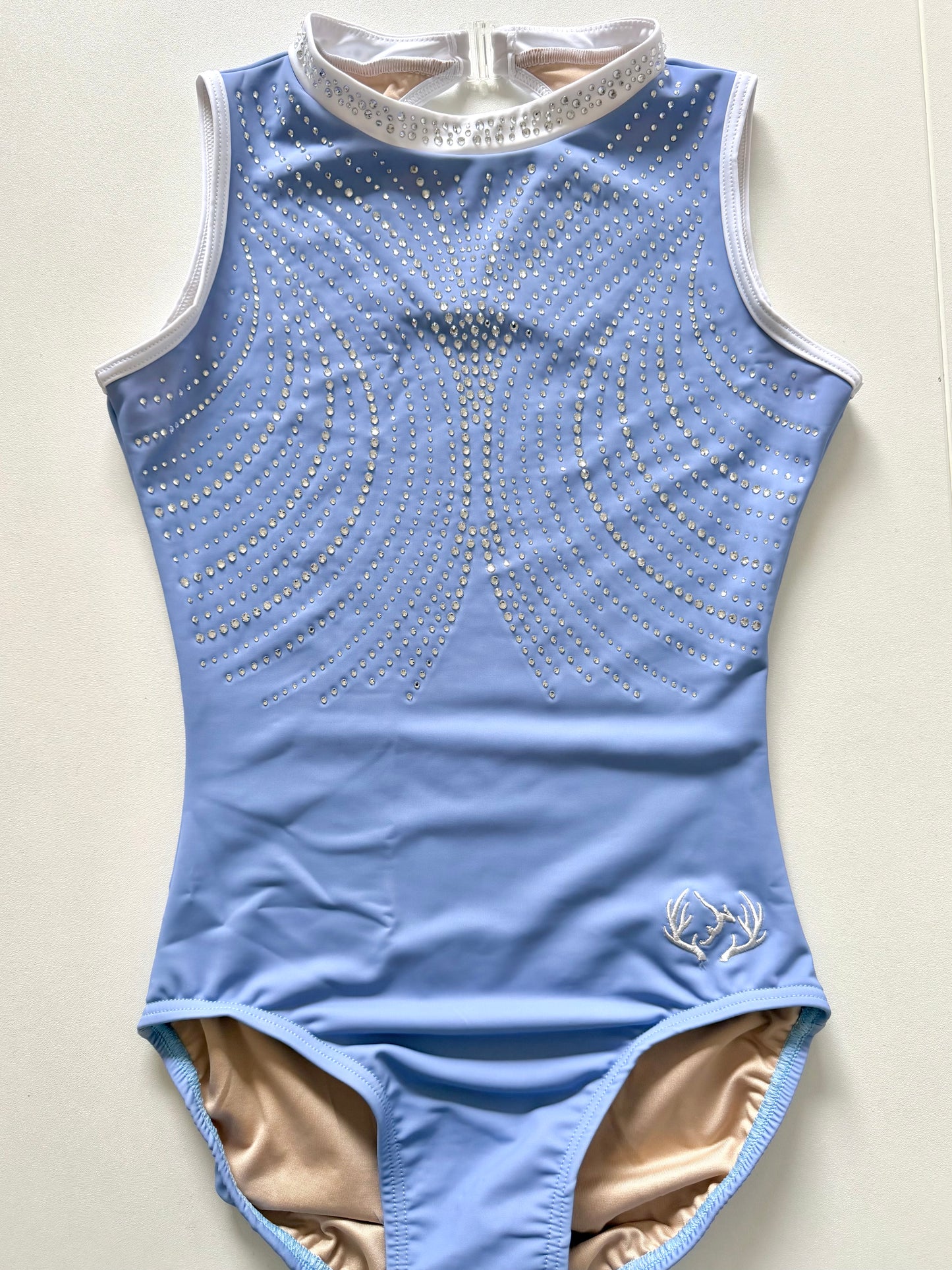 Cornflower blue gymnastics leotard.
