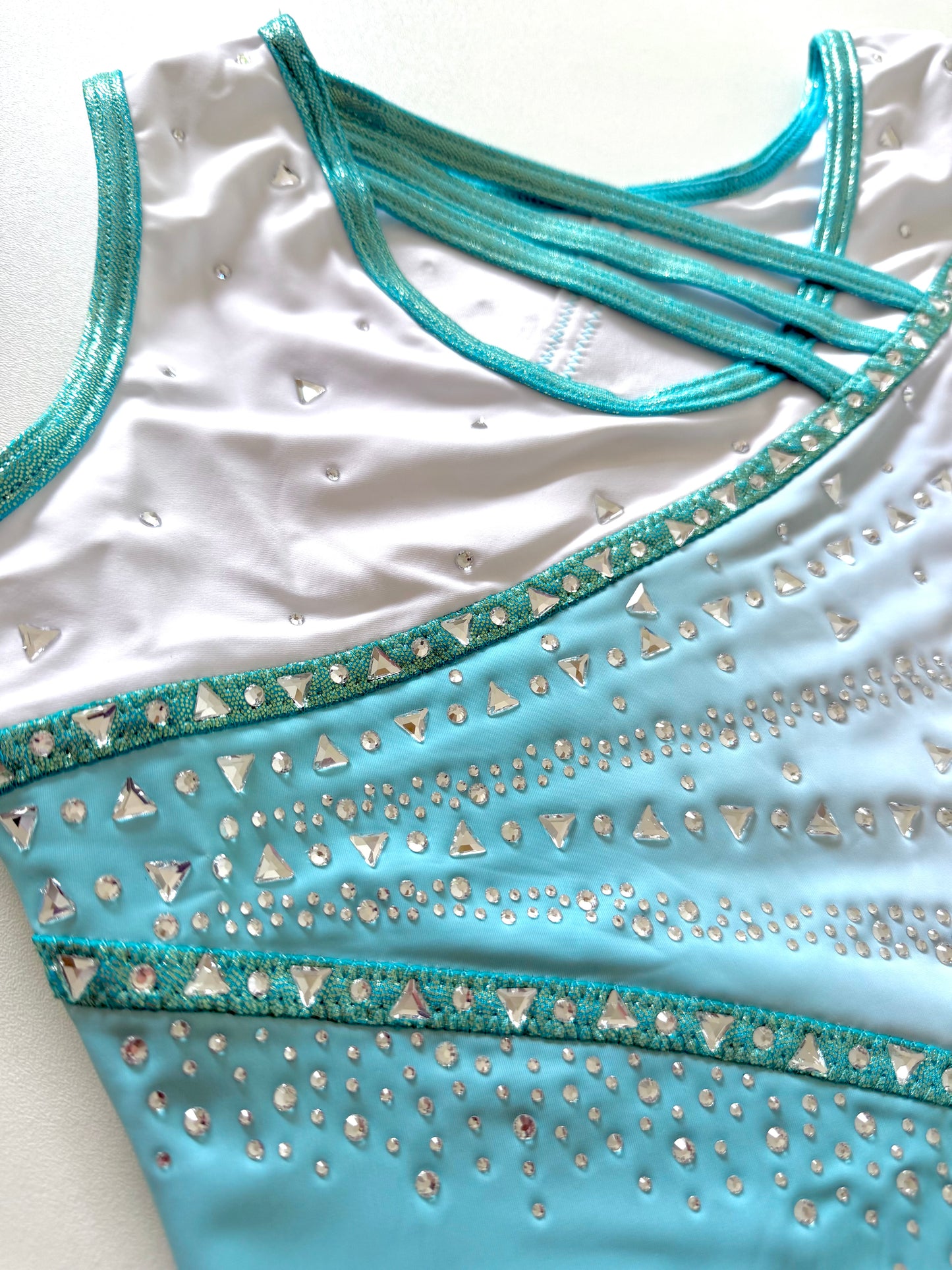 Strappy closed back leotard.